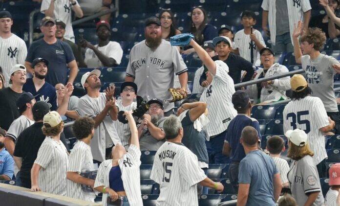 Yankees Fan Surprises Crowd After Catching Home Run Yankees Fan Surprises Crowd After Catching Home Run